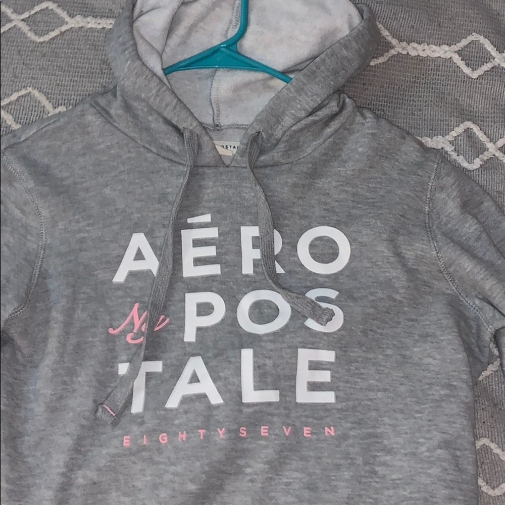 a grey cropped hoodie